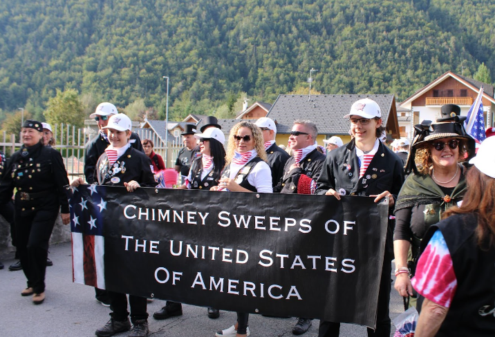 Beau and Will with the America Chimney Sweeps banner